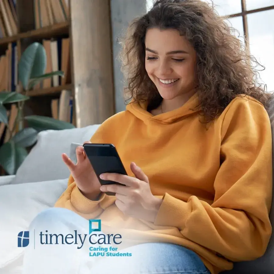 A licensed counselor meeting with a student by video